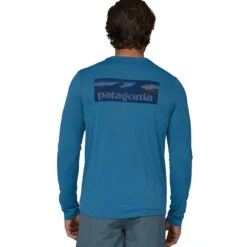 Patagonia Men's L/S Capilene Cool Daily Graphic Shirt - Waters - Boardshort Logo: Wavy Blue X-Dye 9 Patagonia Men's L/S Capilene Cool Daily Graphic Shirt - Waters - Boardshort Logo: Wavy Blue X-Dye -Patagonia Outlet Sales Patagonia SS23 LSCapCoolGraphicWater BLWX 05